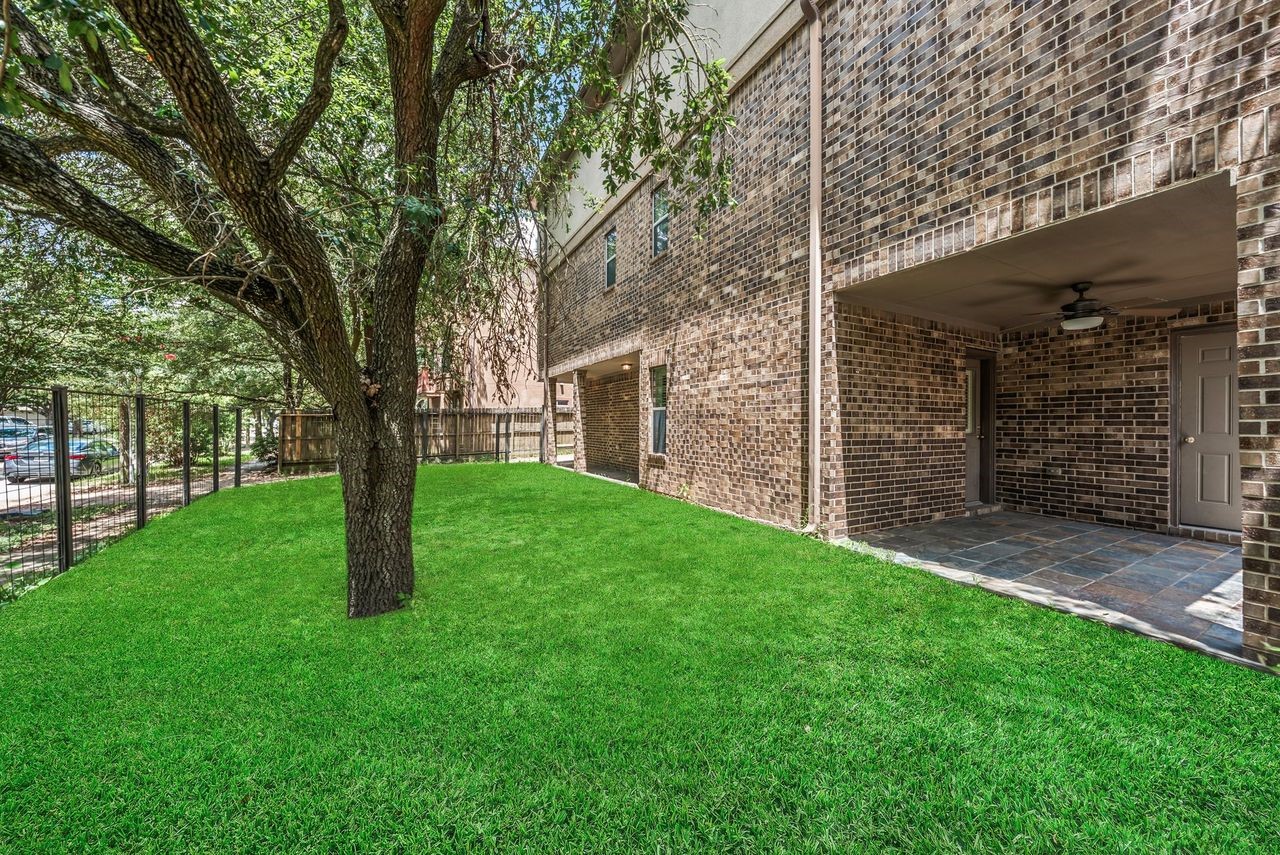 4018 Childress Street Houston, TX 77005 - Photo 5 of 20 Access to backyard from 1st floor bedroom