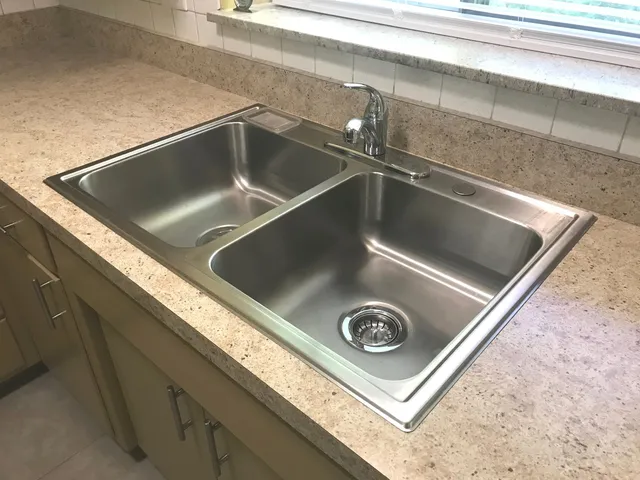 a bathroom with a shower and a tub
