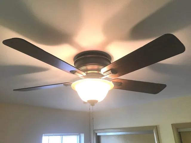 a front view of a house with white walls