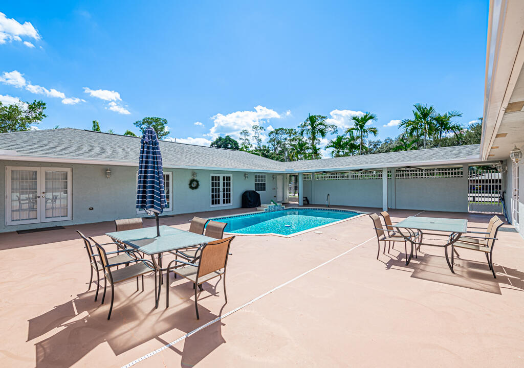 1858 F Road Loxahatchee Groves, FL 33470 - Photo 28 of 87 pool and patio