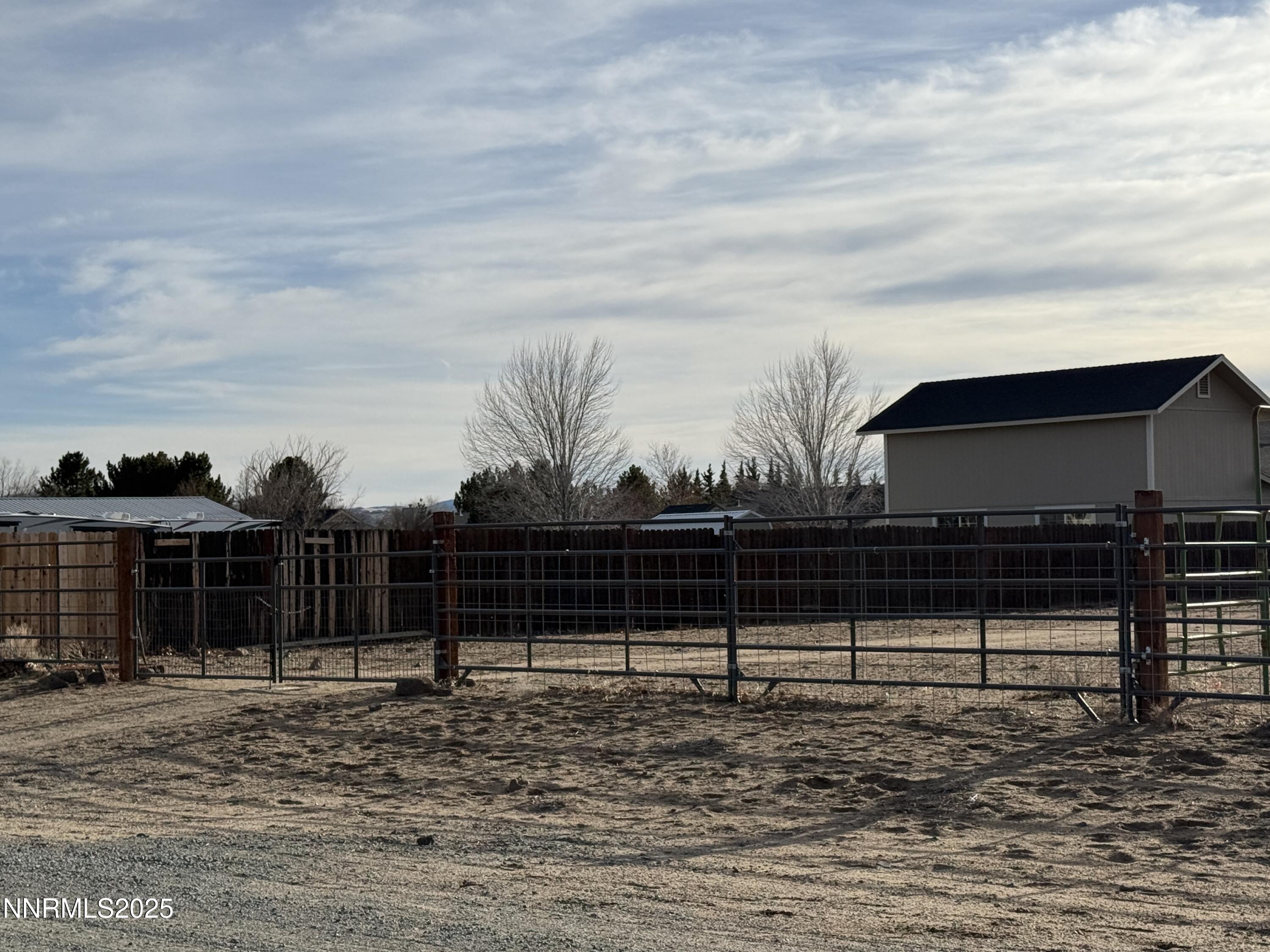 25 Nives Court Sparks, NV 89441 - Photo 62 of 67 a view of a yard with wooden fence
