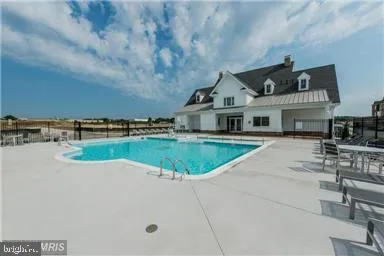 a view of a house with a swimming pool