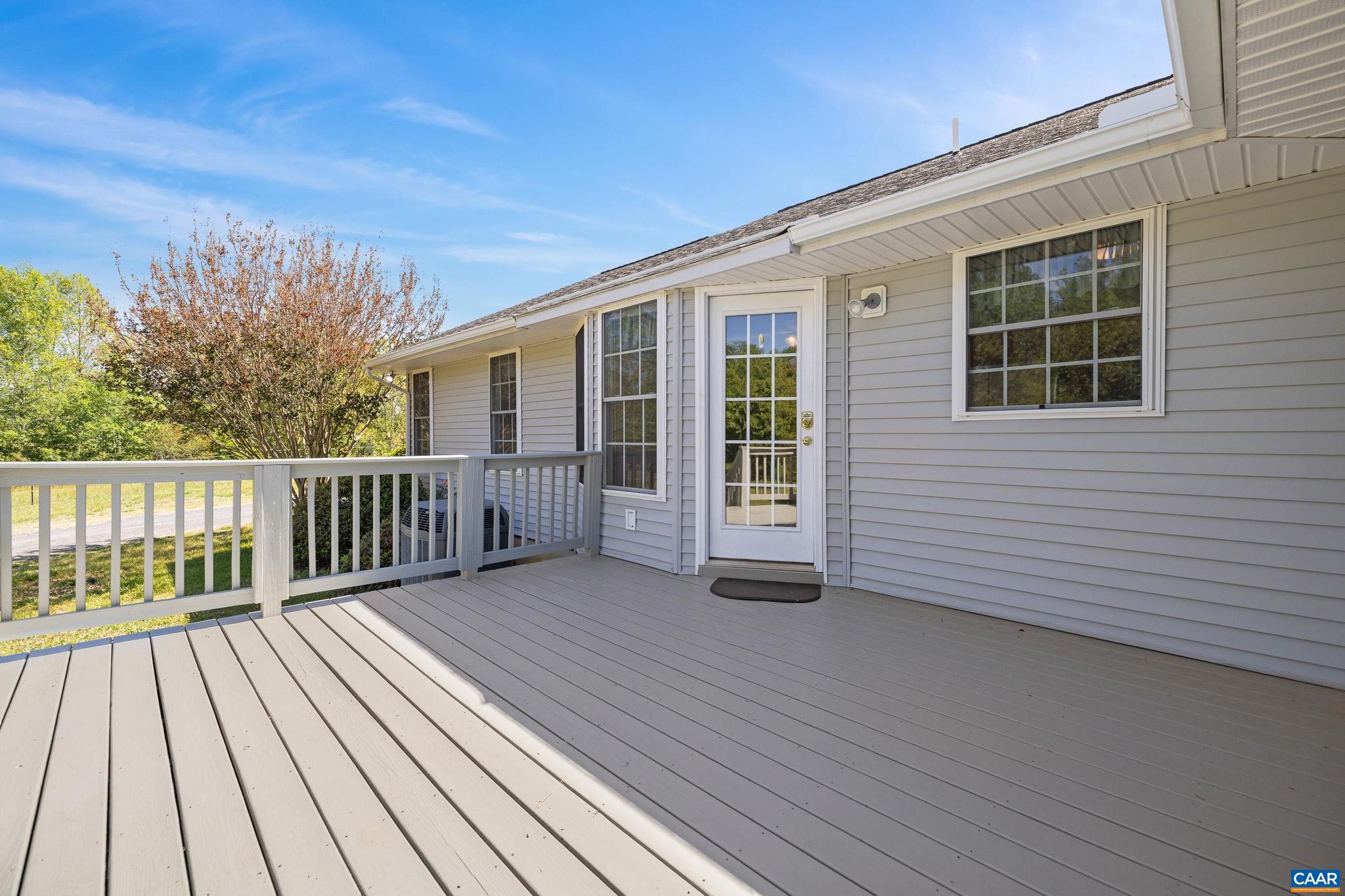 1075 Social Hall Road New Canton, VA 23123 - Photo 21 of 64 a view of a house with wooden deck