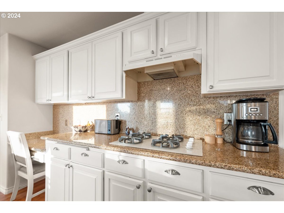 2509 Northwest 36th Avenue Camas, WA 98607 - Photo 14 of 48 a kitchen with granite countertop white cabinets and sink