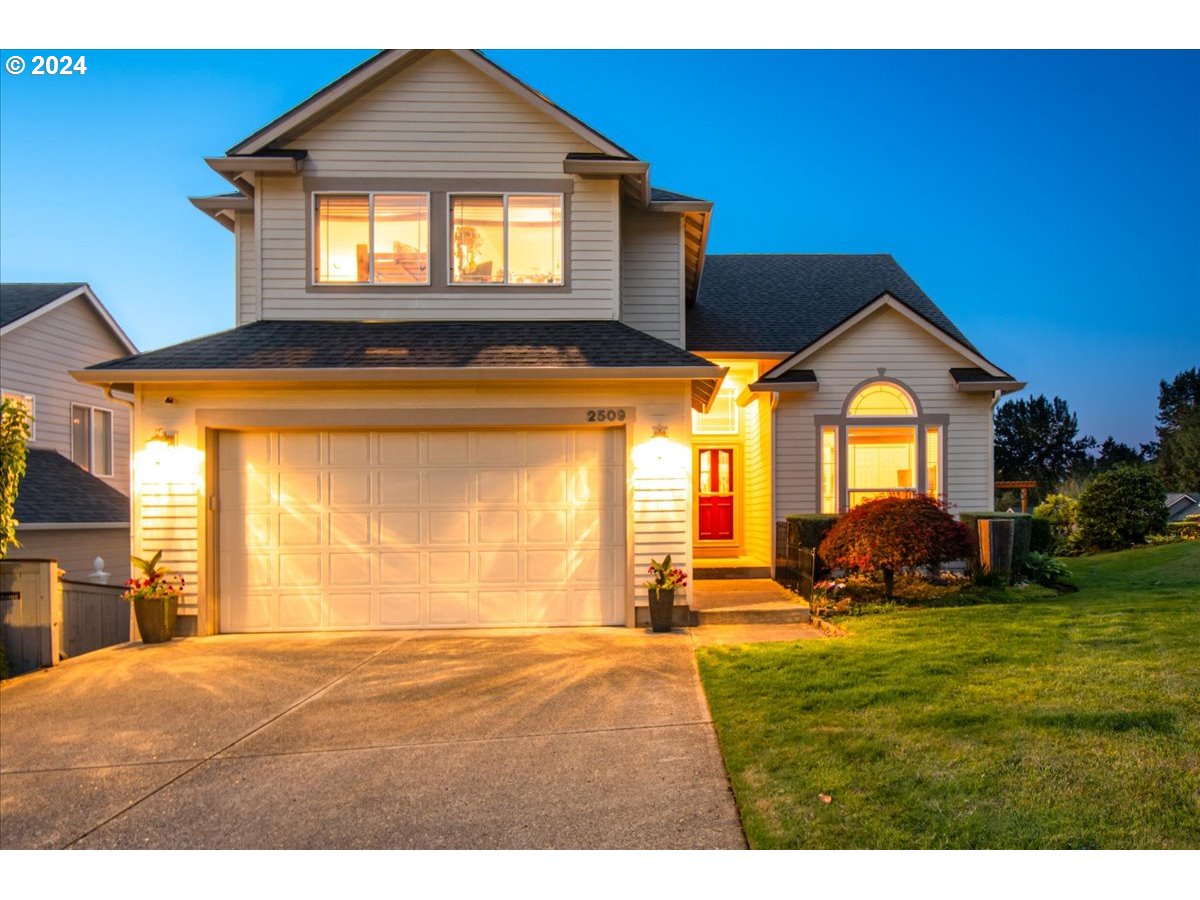2509 Northwest 36th Avenue Camas, WA 98607 - Photo 3 of 48 a front view of a house with a yard