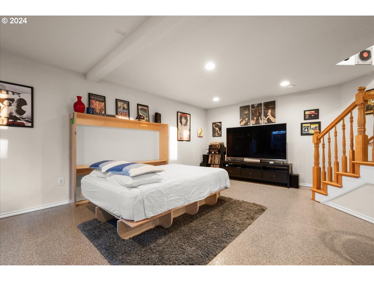 2509 Northwest 36th Avenue Camas, WA 98607 - Photo 39 of 48 a bedroom with furniture and a flat screen tv