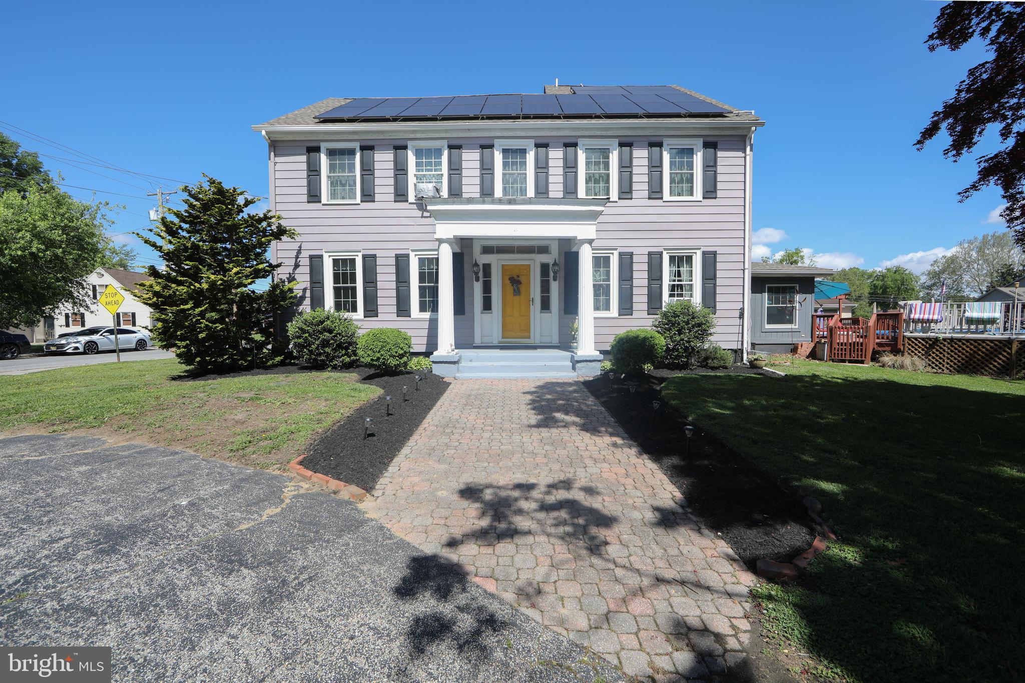 86 Kansas Road Pennsville, NJ 08070 - Photo 1 of 46 a front view of a house with a yard