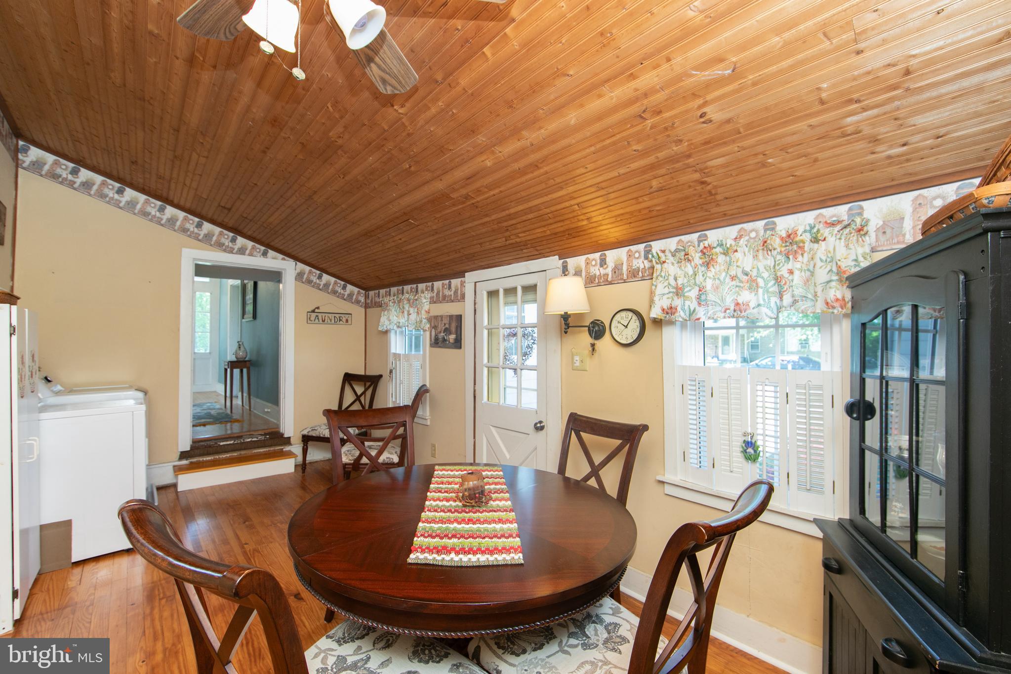 86 Kansas Road Pennsville, NJ 08070 - Photo 12 of 46 a view of a dining room with furniture window and wooden floor