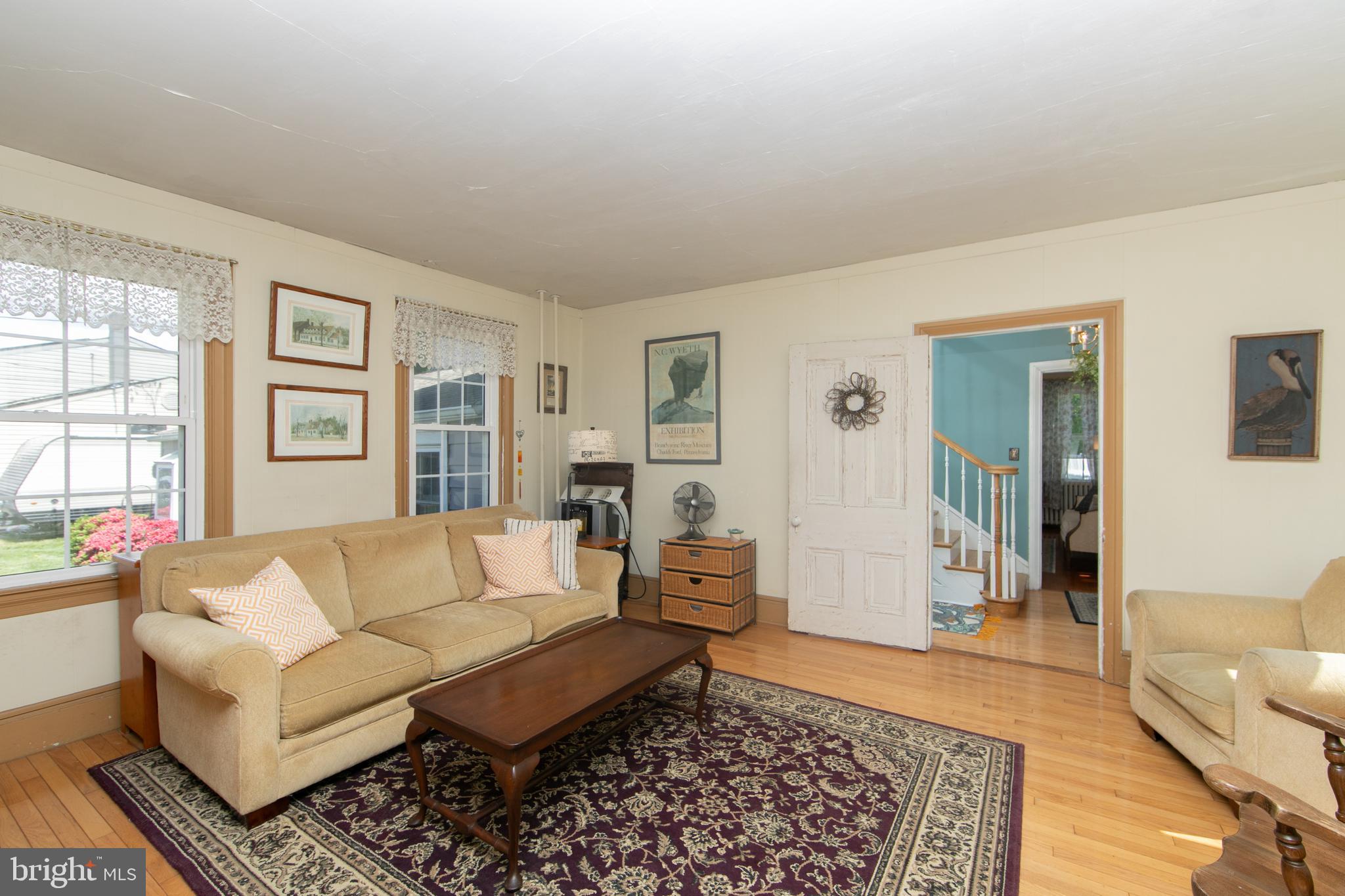 86 Kansas Road Pennsville, NJ 08070 - Photo 19 of 46 a living room with furniture and a rug