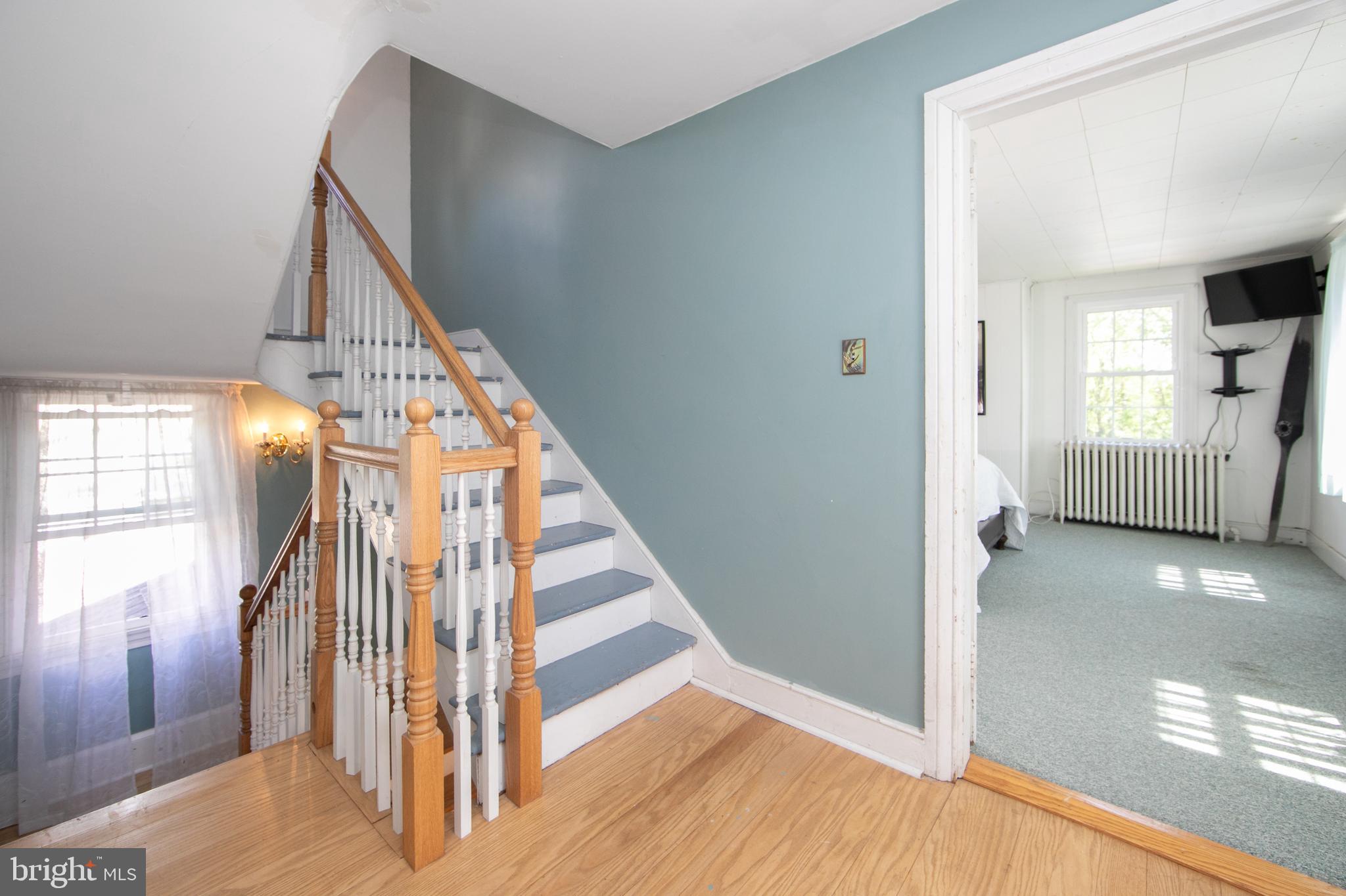 86 Kansas Road Pennsville, NJ 08070 - Photo 21 of 46 a view of entryway and hall with wooden floor