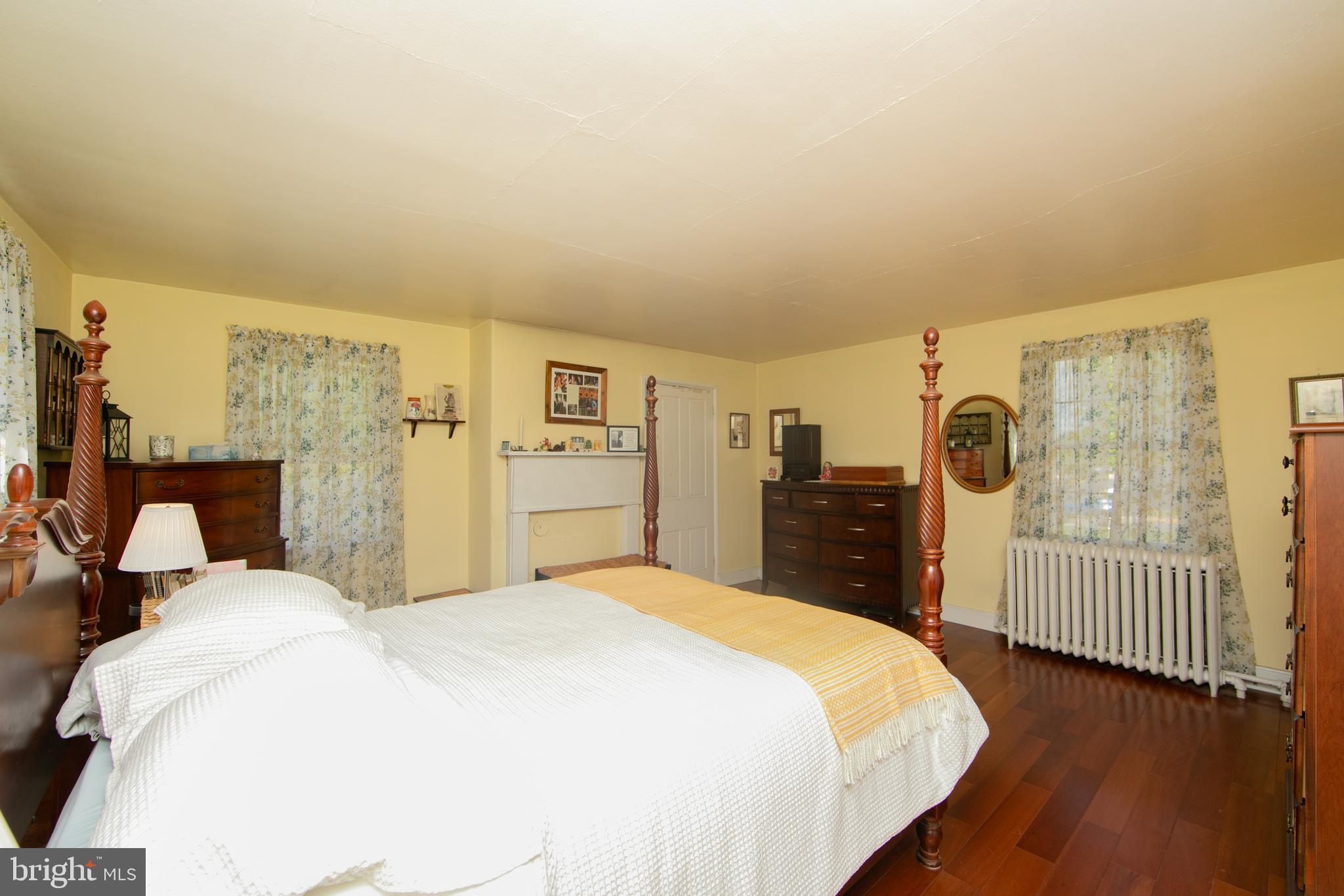 86 Kansas Road Pennsville, NJ 08070 - Photo 22 of 46 a bedroom with a bed and a window