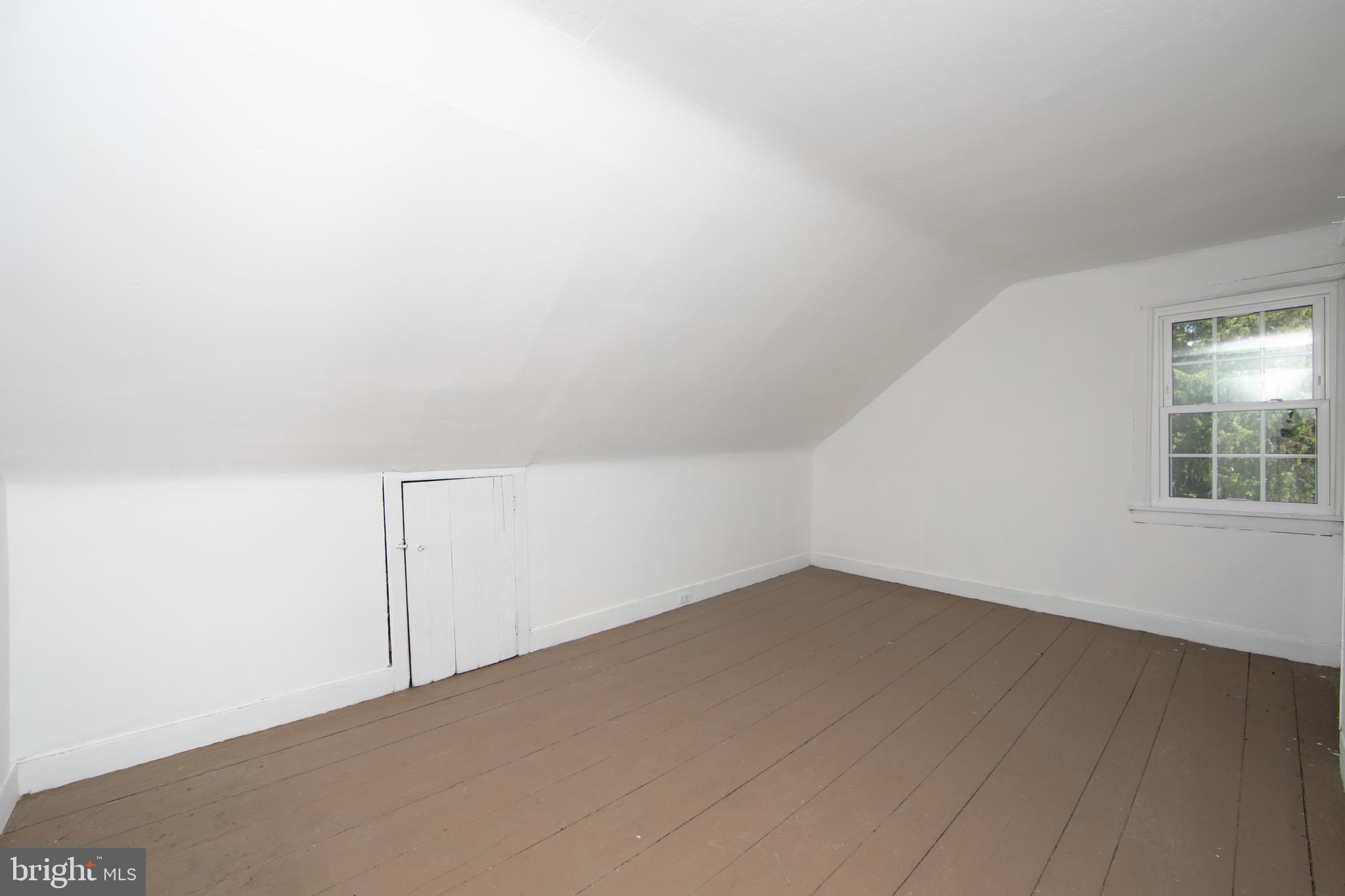86 Kansas Road Pennsville, NJ 08070 - Photo 36 of 46 an empty room with a empty space and window