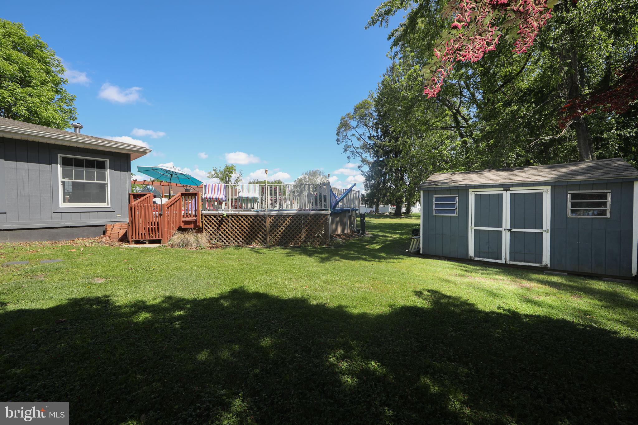 86 Kansas Road Pennsville, NJ 08070 - Photo 41 of 46 a view of a house with backyard and garden
