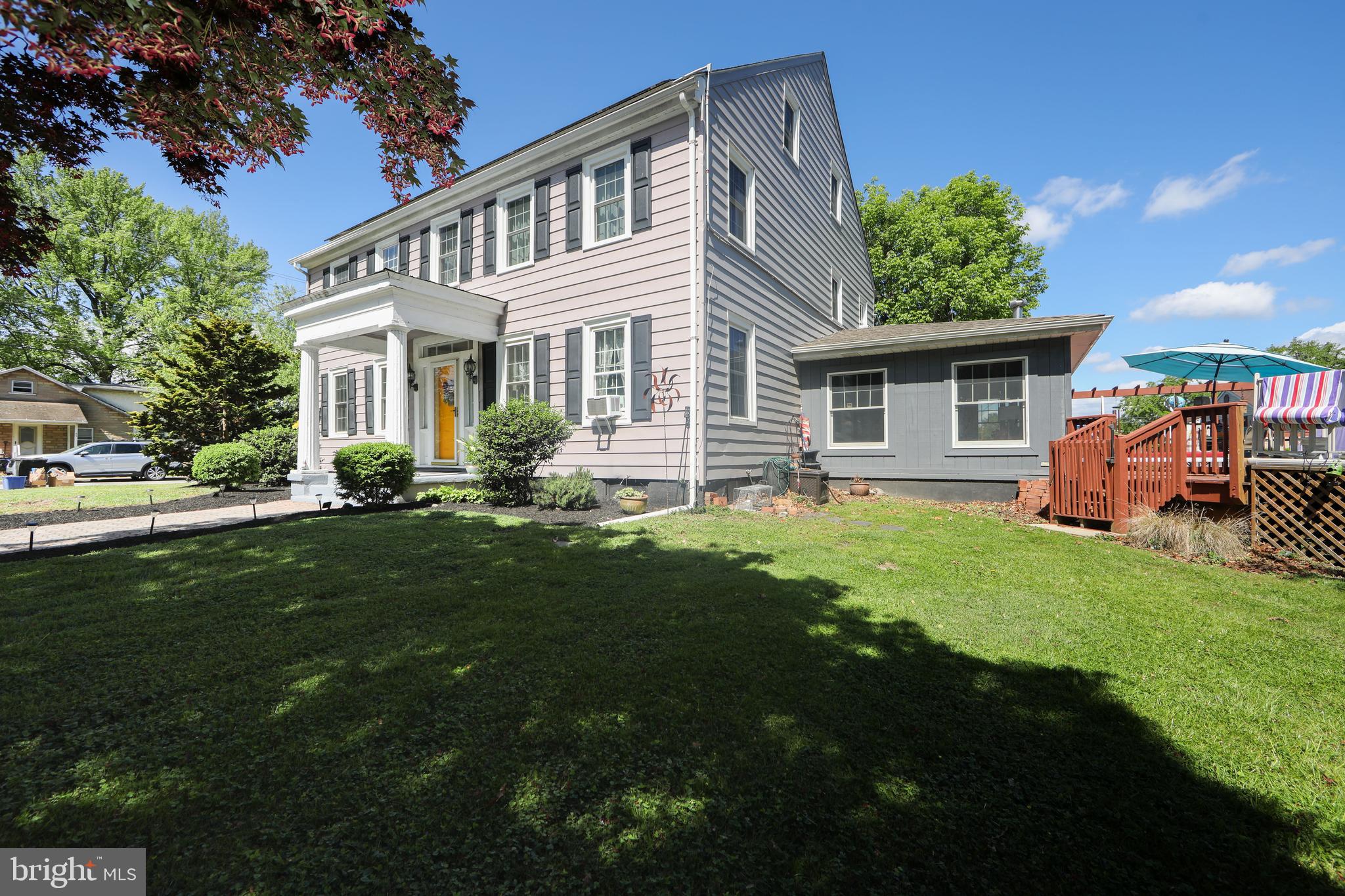 86 Kansas Road Pennsville, NJ 08070 - Photo 44 of 46 a front view of house with yard and green space