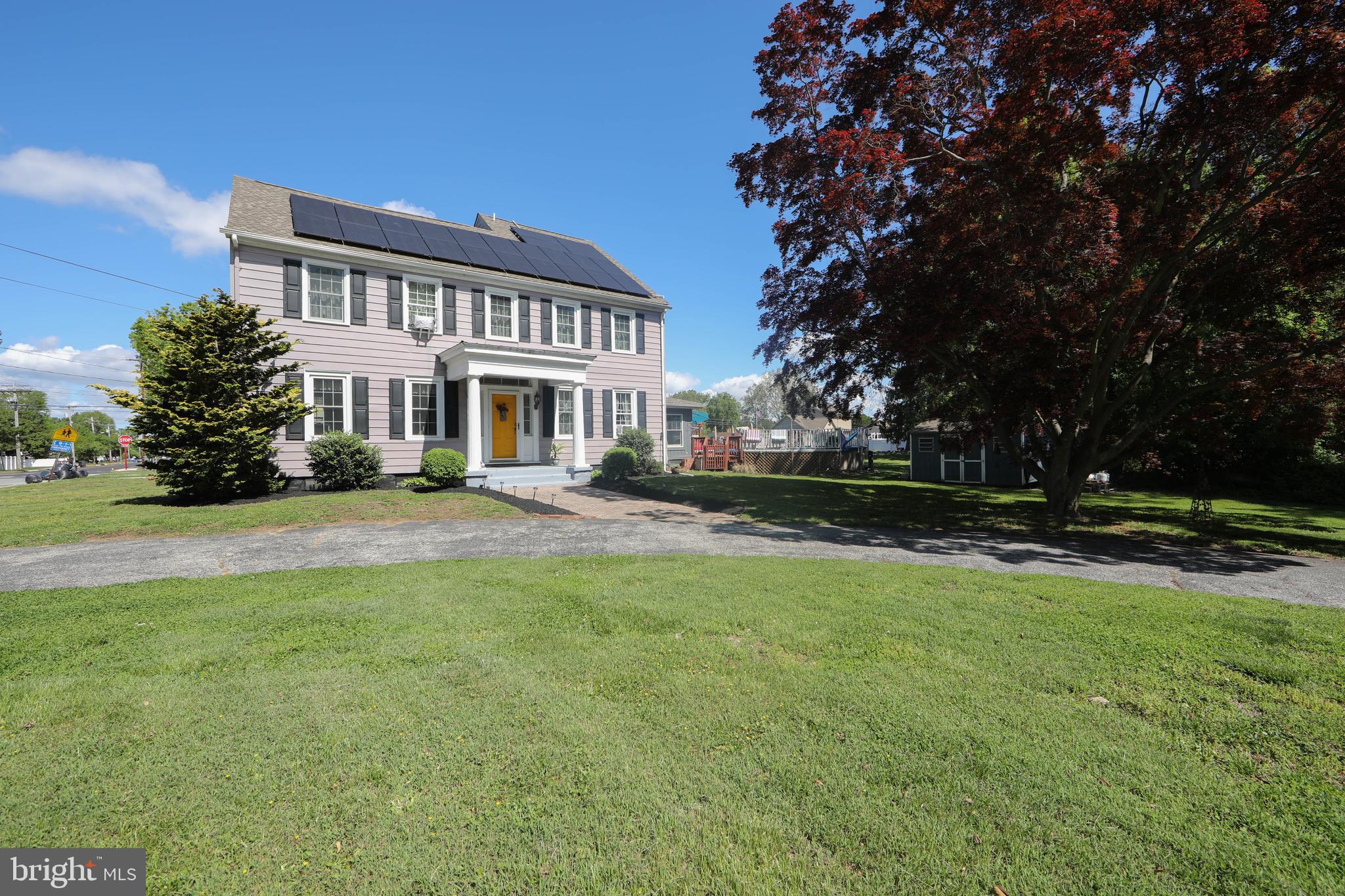 86 Kansas Road Pennsville, NJ 08070 - Photo 46 of 46 a front view of a house with a yard