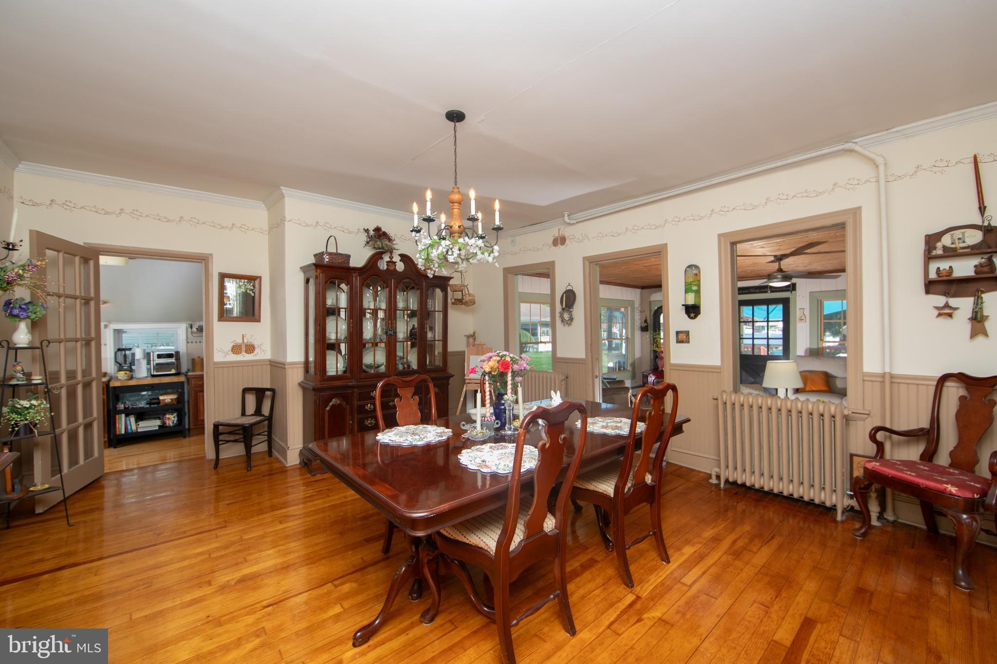 86 Kansas Road Pennsville, NJ 08070 - Photo 7 of 46 a view of a dining room with furniture and wooden floor
