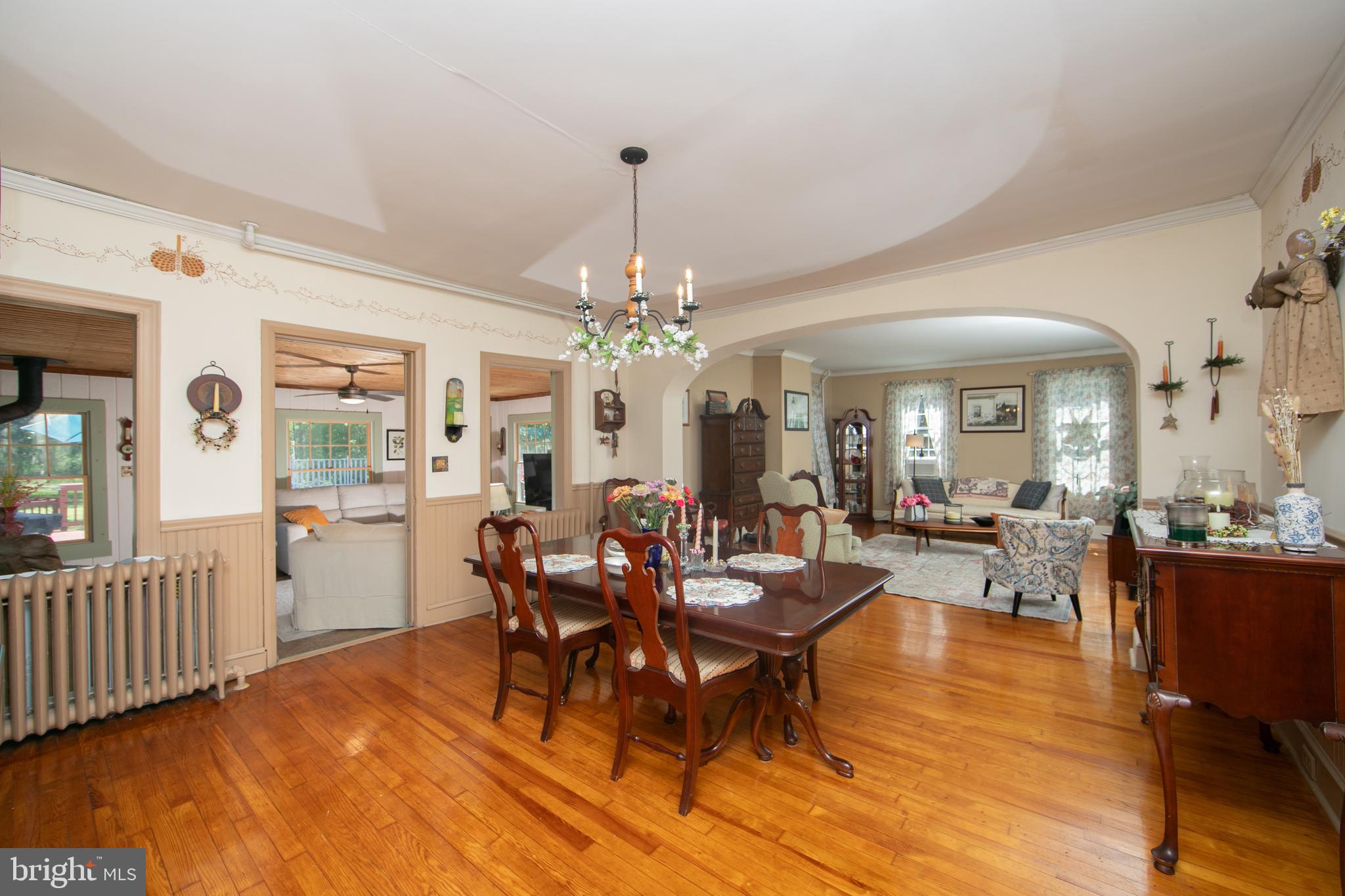 86 Kansas Road Pennsville, NJ 08070 - Photo 8 of 46 a view of a dining room with furniture window and wooden floor