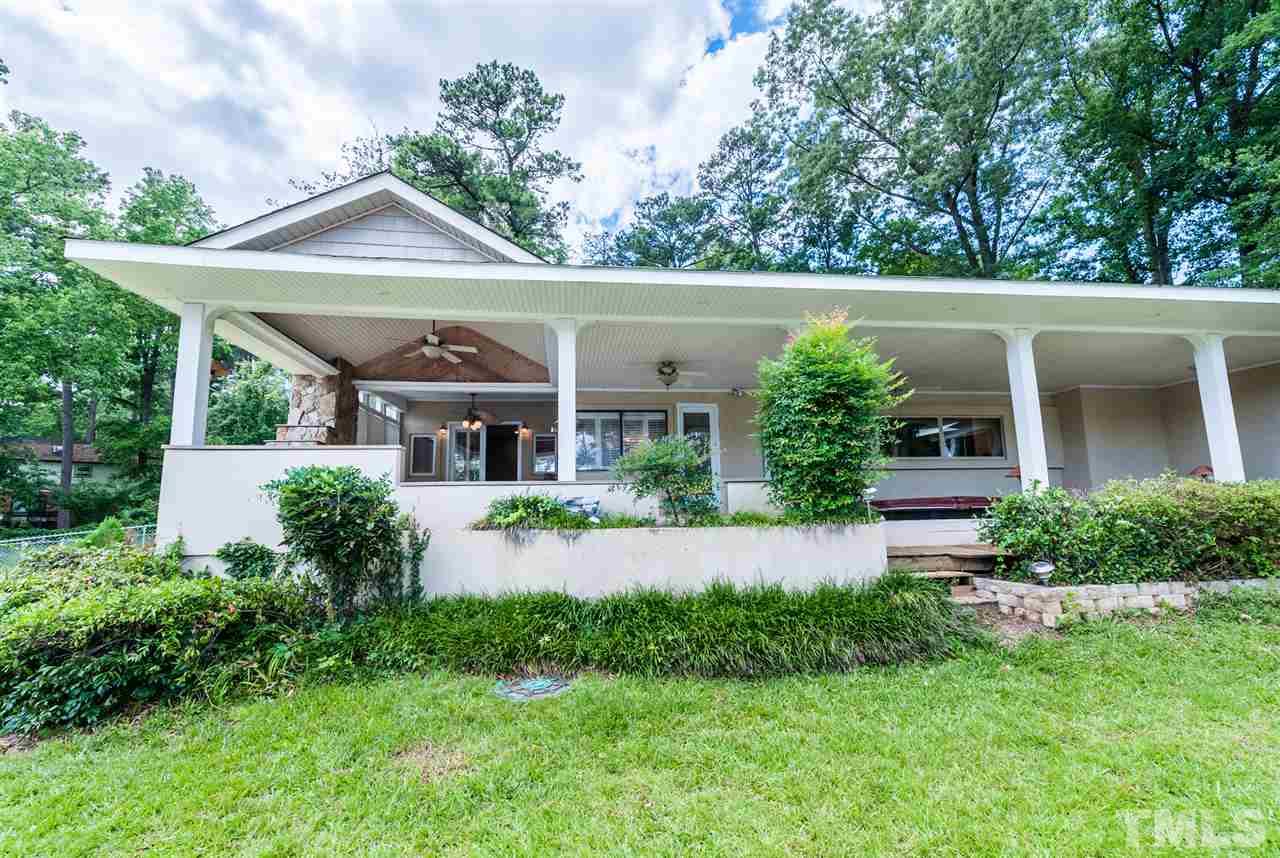 4308 Ryegate Drive Raleigh, NC 27604 - Photo 20 of 23 a front view of a house with a yard