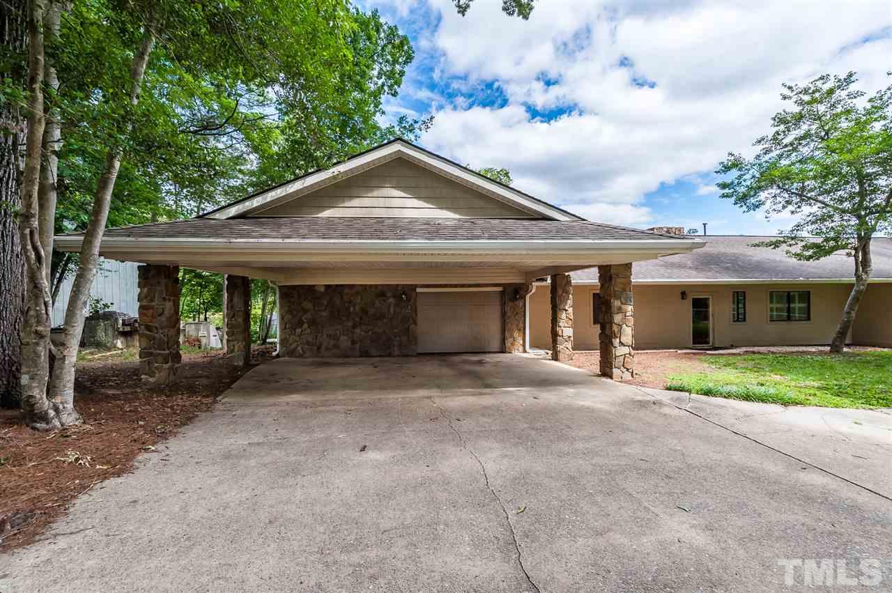 4308 Ryegate Drive Raleigh, NC 27604 - Photo 3 of 23 a front view of a house with garden