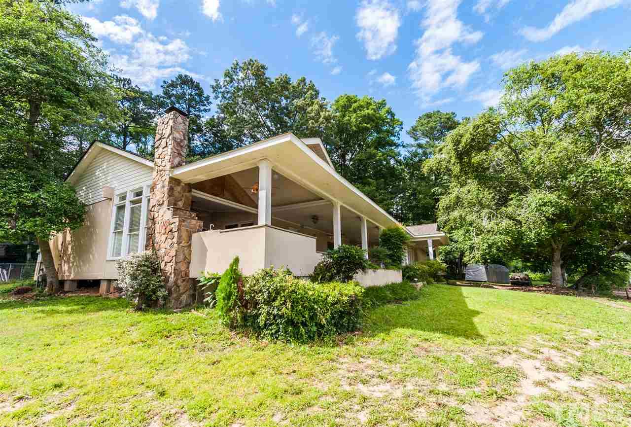 4308 Ryegate Drive Raleigh, NC 27604 - Photo 21 of 23 a view of a house with backyard and garden