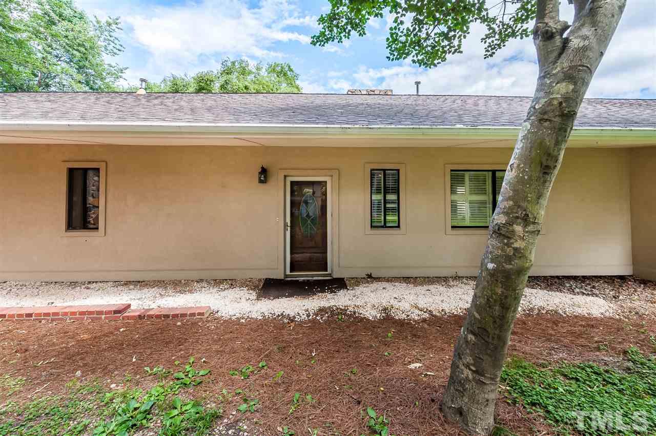 4308 Ryegate Drive Raleigh, NC 27604 - Photo 4 of 23 a backyard of a house