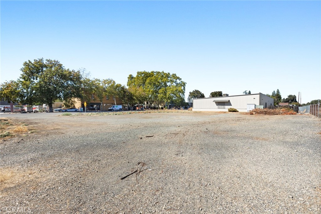 9386 Midway Durham, CA 95938 - Photo 7 of 10 a view of a road with a building in the background