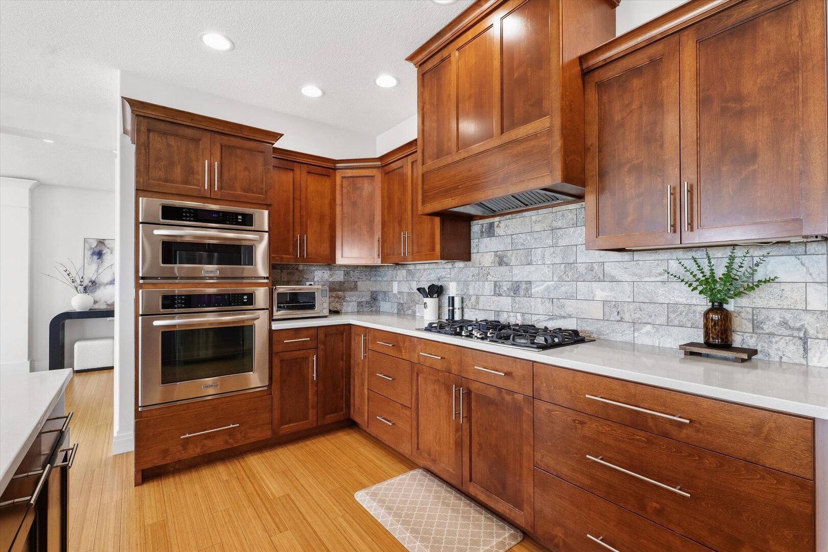 1117 Declaration Drive Savoy, IL 61874 - Photo 17 of 56 a kitchen with granite countertop a stove cabinets and stainless steel appliances