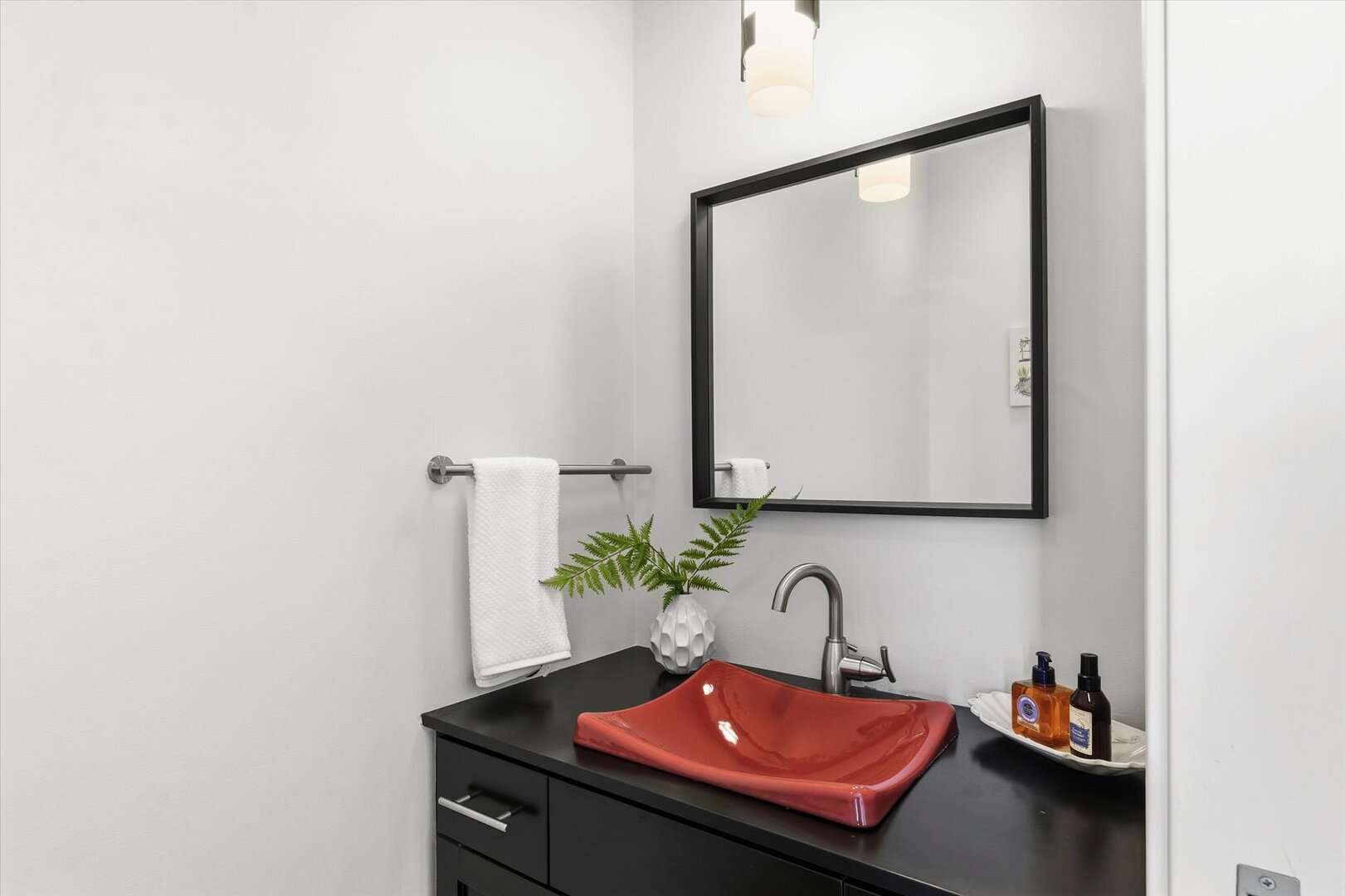 1117 Declaration Drive Savoy, IL 61874 - Photo 20 of 56 a bathroom with a sink and a mirror