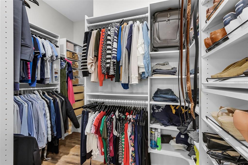 11720 Darsey Road Parrish, FL 34219 - Photo 24 of 60 a view of walk in closet with clothes and shoes