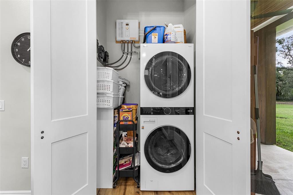 11720 Darsey Road Parrish, FL 34219 - Photo 27 of 60 a utility room with dryer and washer