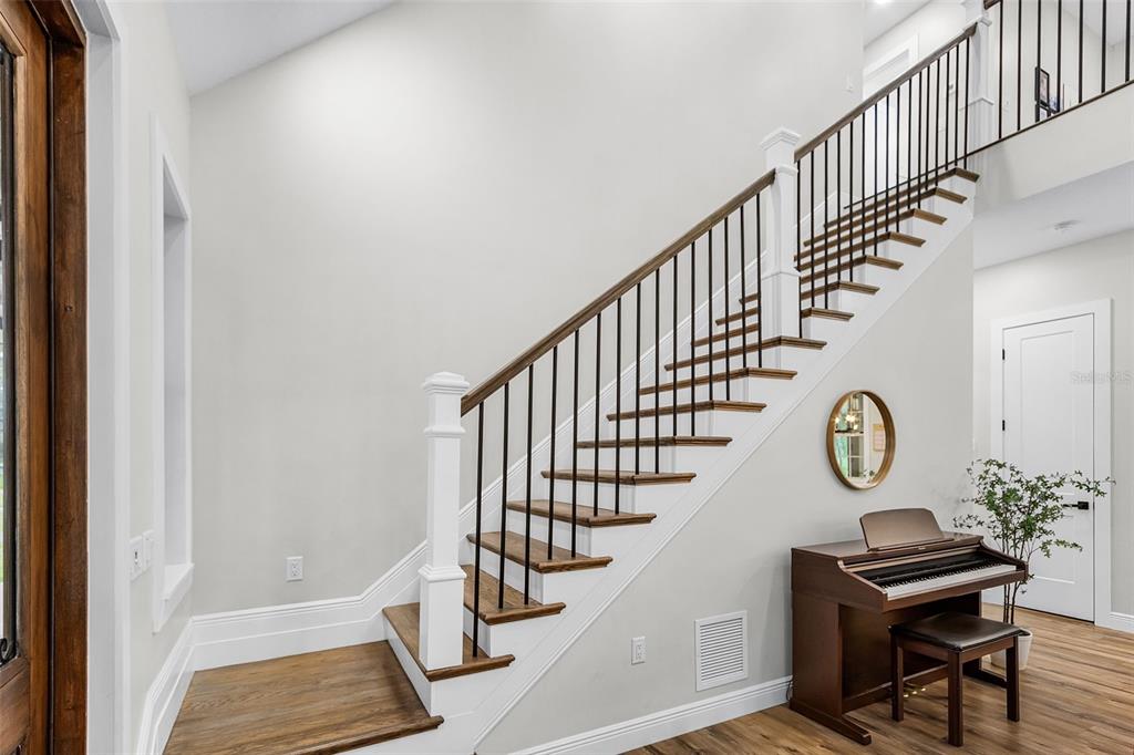 11720 Darsey Road Parrish, FL 34219 - Photo 29 of 60 a view of entryway and hall with wooden floor