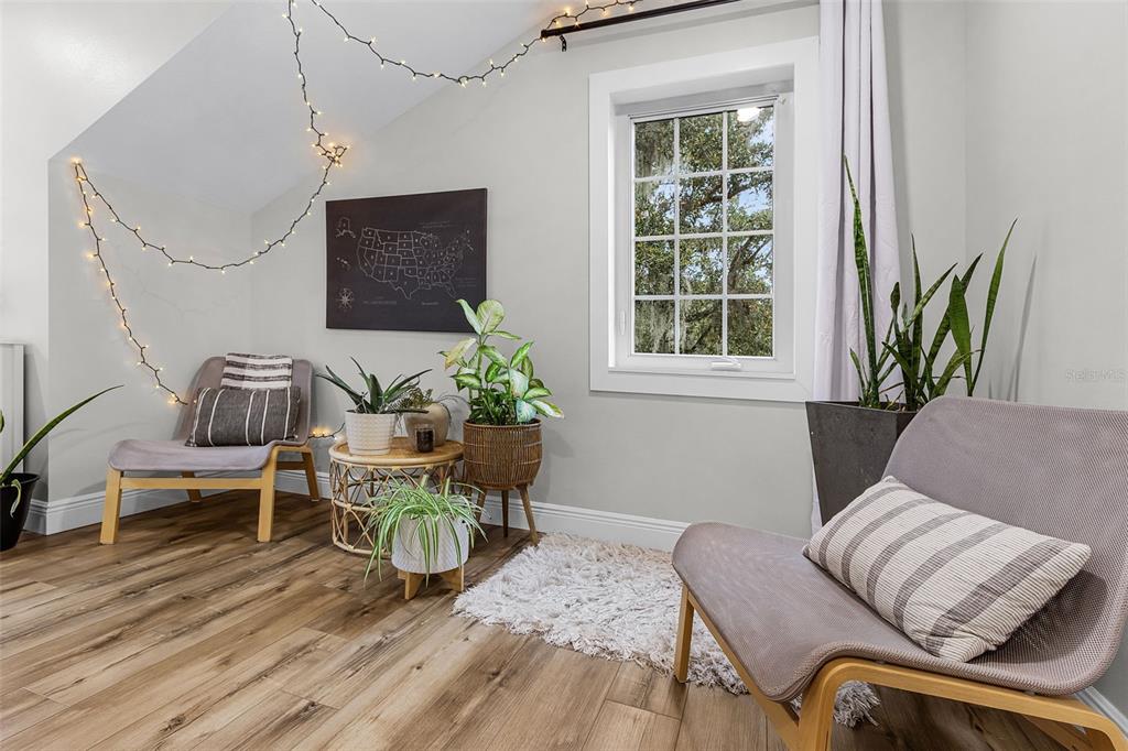 11720 Darsey Road Parrish, FL 34219 - Photo 35 of 60 a living room with furniture and a potted plant