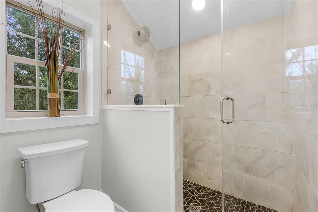 11720 Darsey Road Parrish, FL 34219 - Photo 37 of 60 a bathroom with a sink toilet and shower