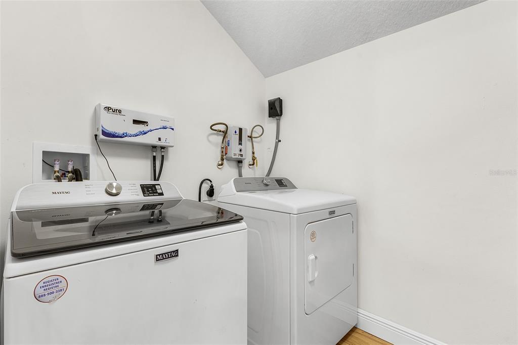 11720 Darsey Road Parrish, FL 34219 - Photo 40 of 60 a bathroom with a sink and a mirror