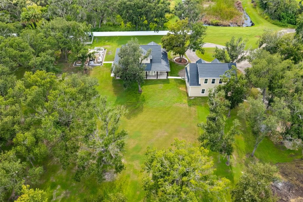11720 Darsey Road Parrish, FL 34219 - Photo 46 of 60 an aerial view of a house with a yard