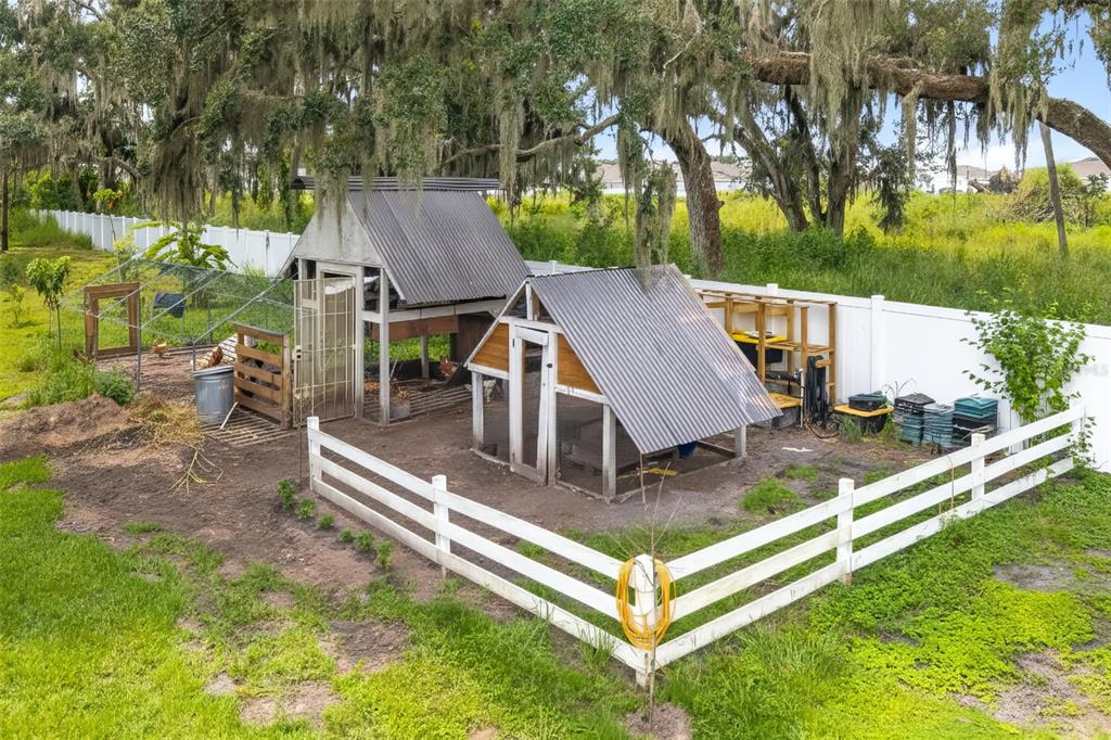 11720 Darsey Road Parrish, FL 34219 - Photo 50 of 60 an aerial view of a house with swimming pool and large trees
