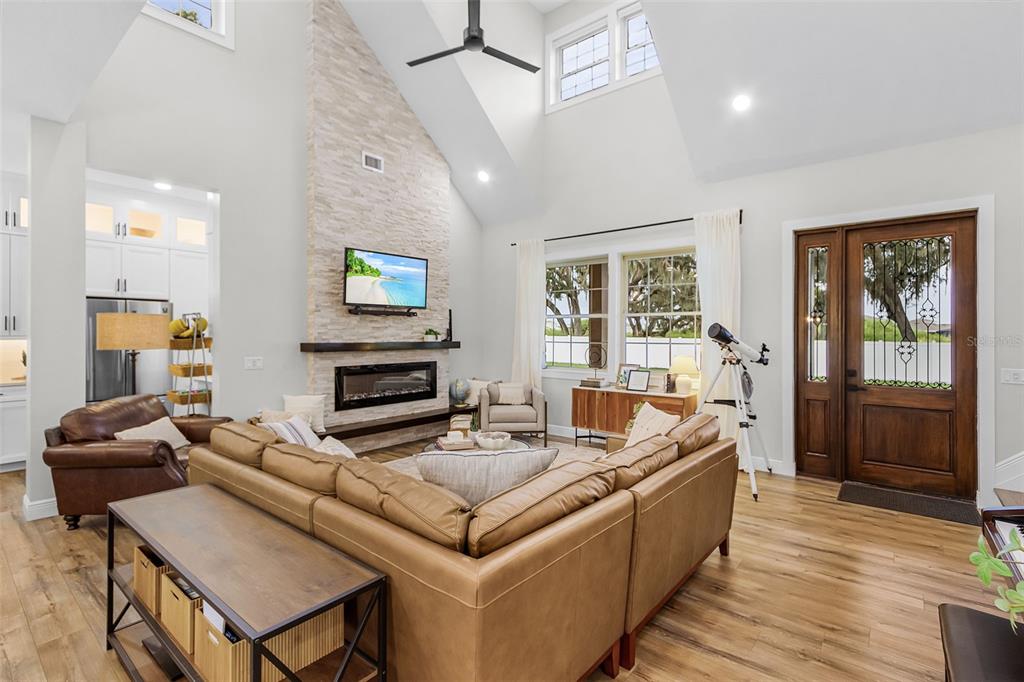 11720 Darsey Road Parrish, FL 34219 - Photo 9 of 60 a living room with furniture and a flat screen tv