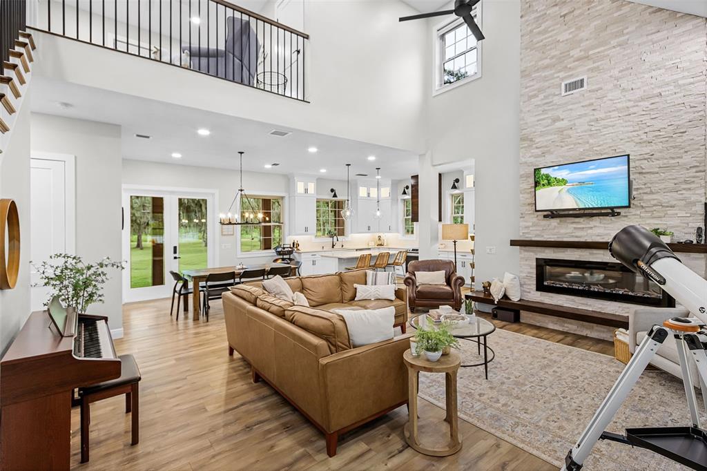 11720 Darsey Road Parrish, FL 34219 - Photo 10 of 60 a living room with furniture and a flat screen tv