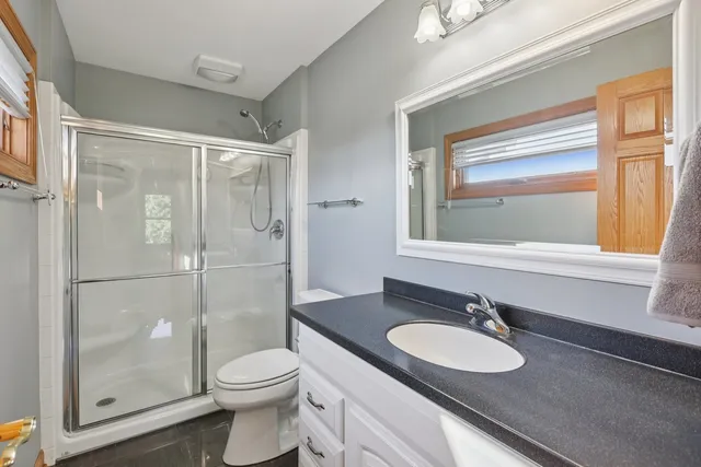a kitchen with a cabinets and window