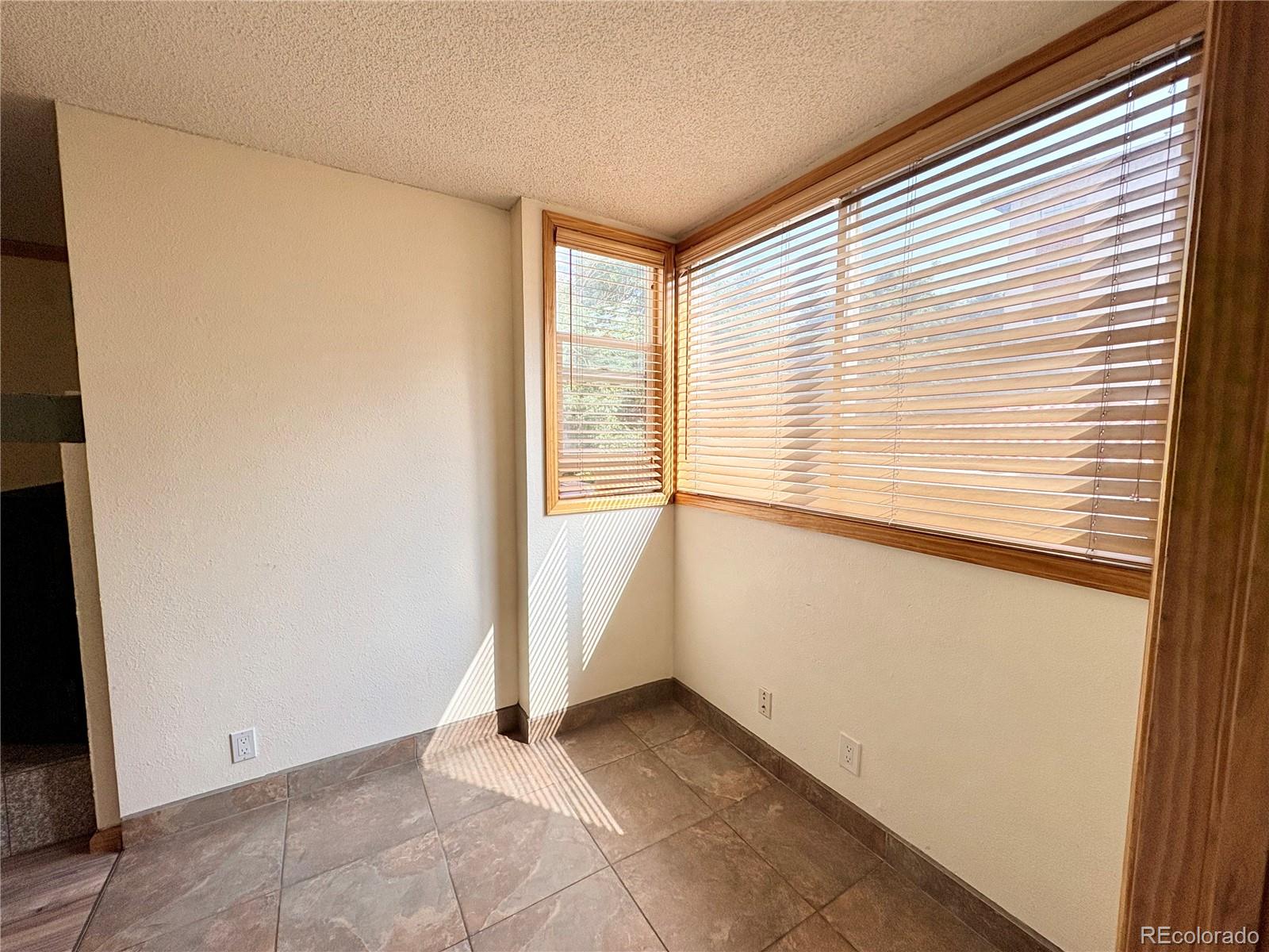 805 29th Street, Unit 253 Boulder, CO 80303 - Photo 18 of 32 a view of an empty room with a window