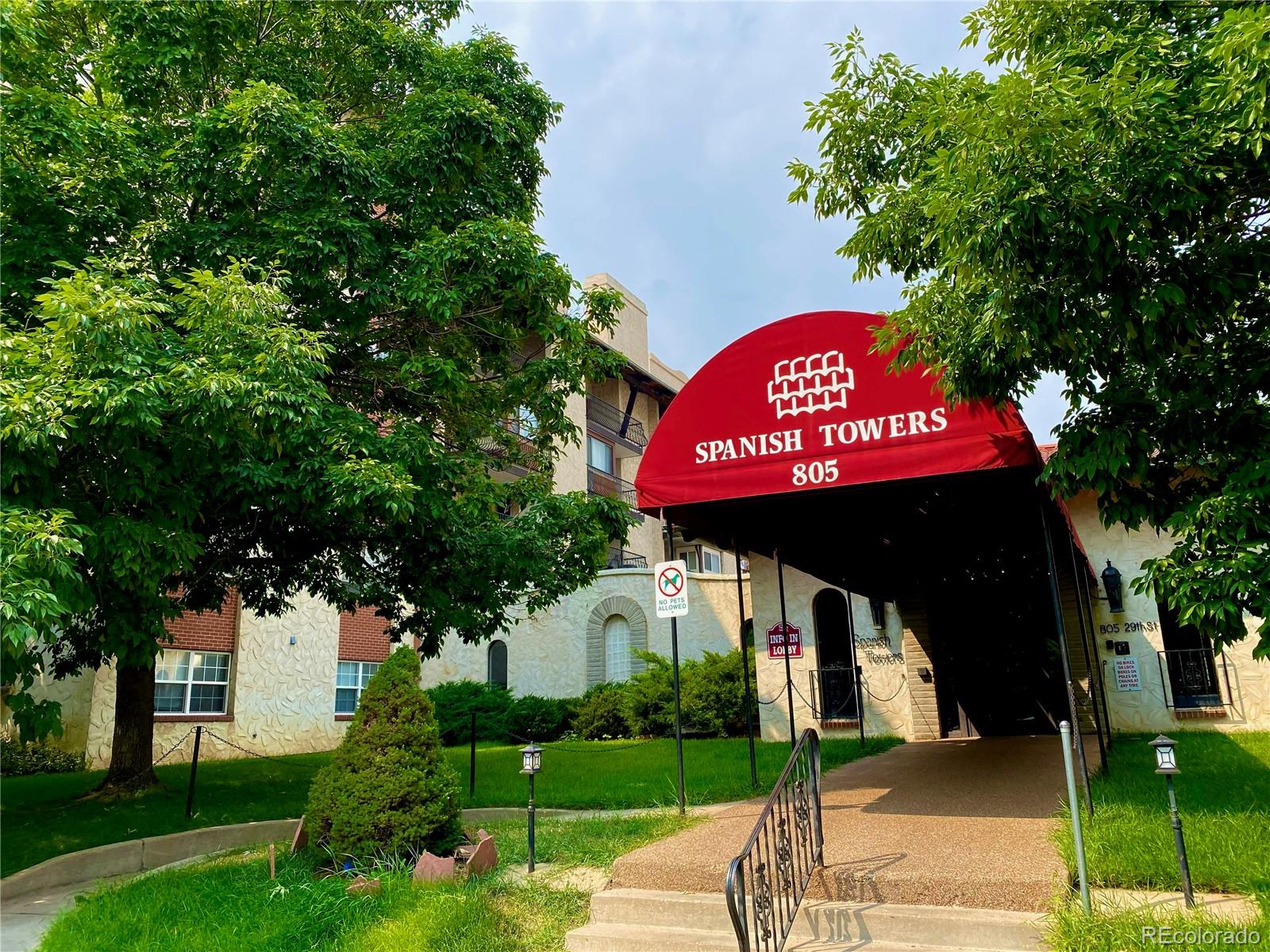 805 29th Street, Unit 253 Boulder, CO 80303 - Photo 2 of 32 a view of a sign that is sitting on a brick wall