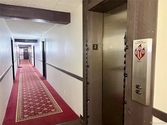 a view of swimming pool with outdoor seating