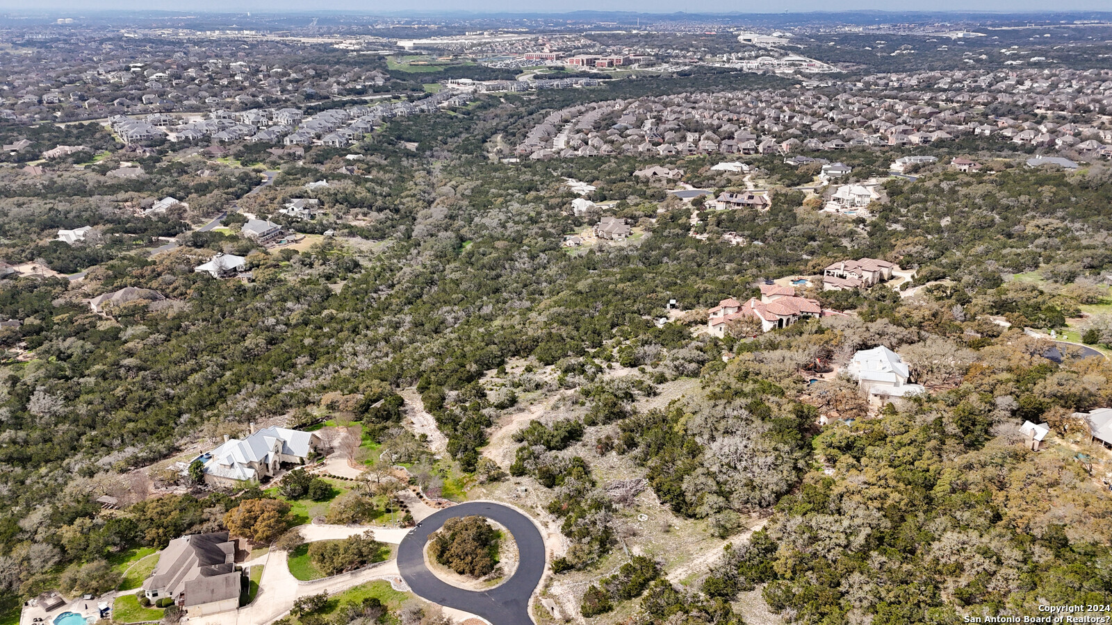 3907 Wilderness Rim San Antonio, TX 78261 - Photo 12 of 17 an aerial view of residential house with yard and mountain view in back