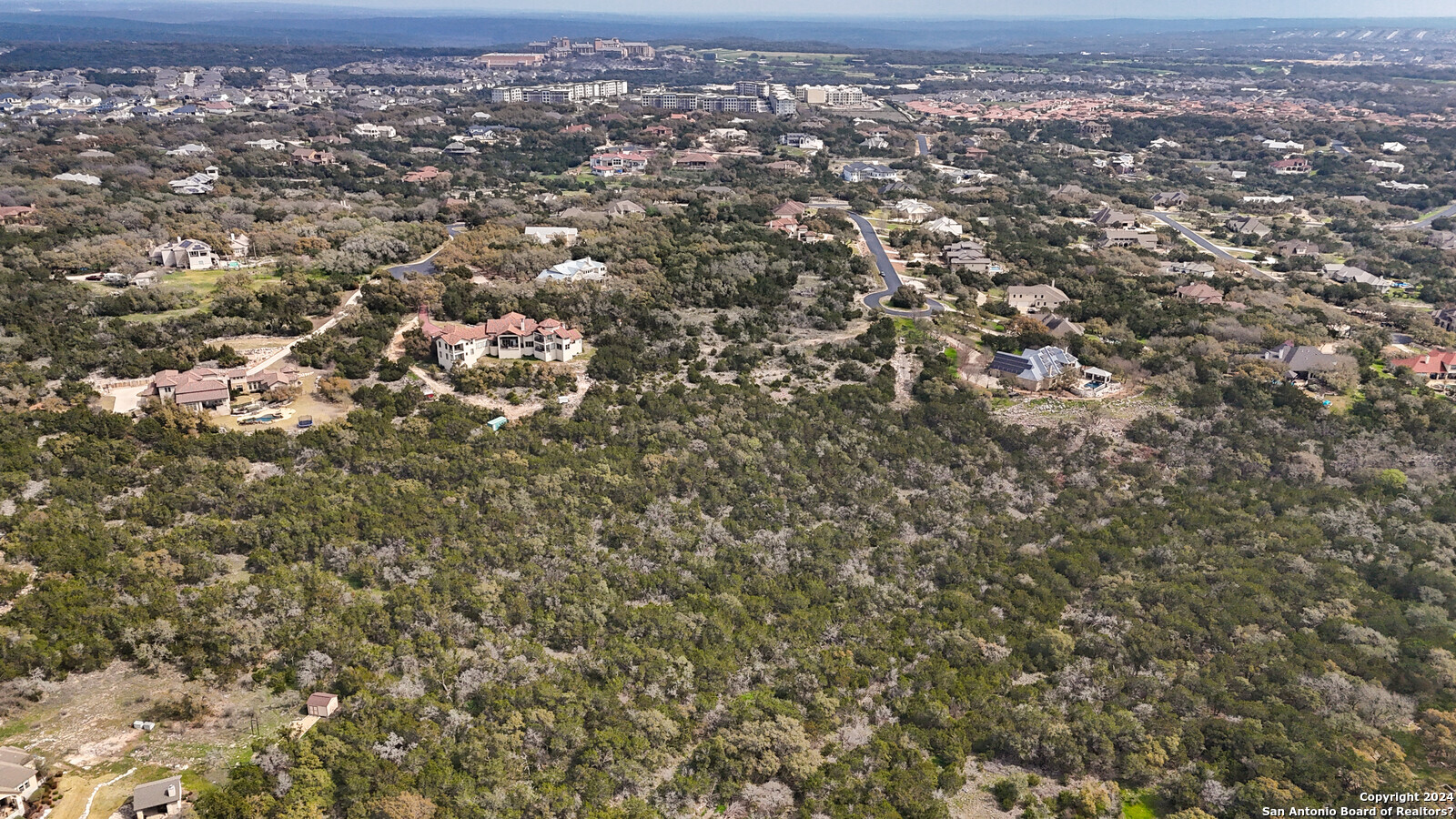 3907 Wilderness Rim San Antonio, TX 78261 - Photo 13 of 17 an aerial view of residential houses with city view