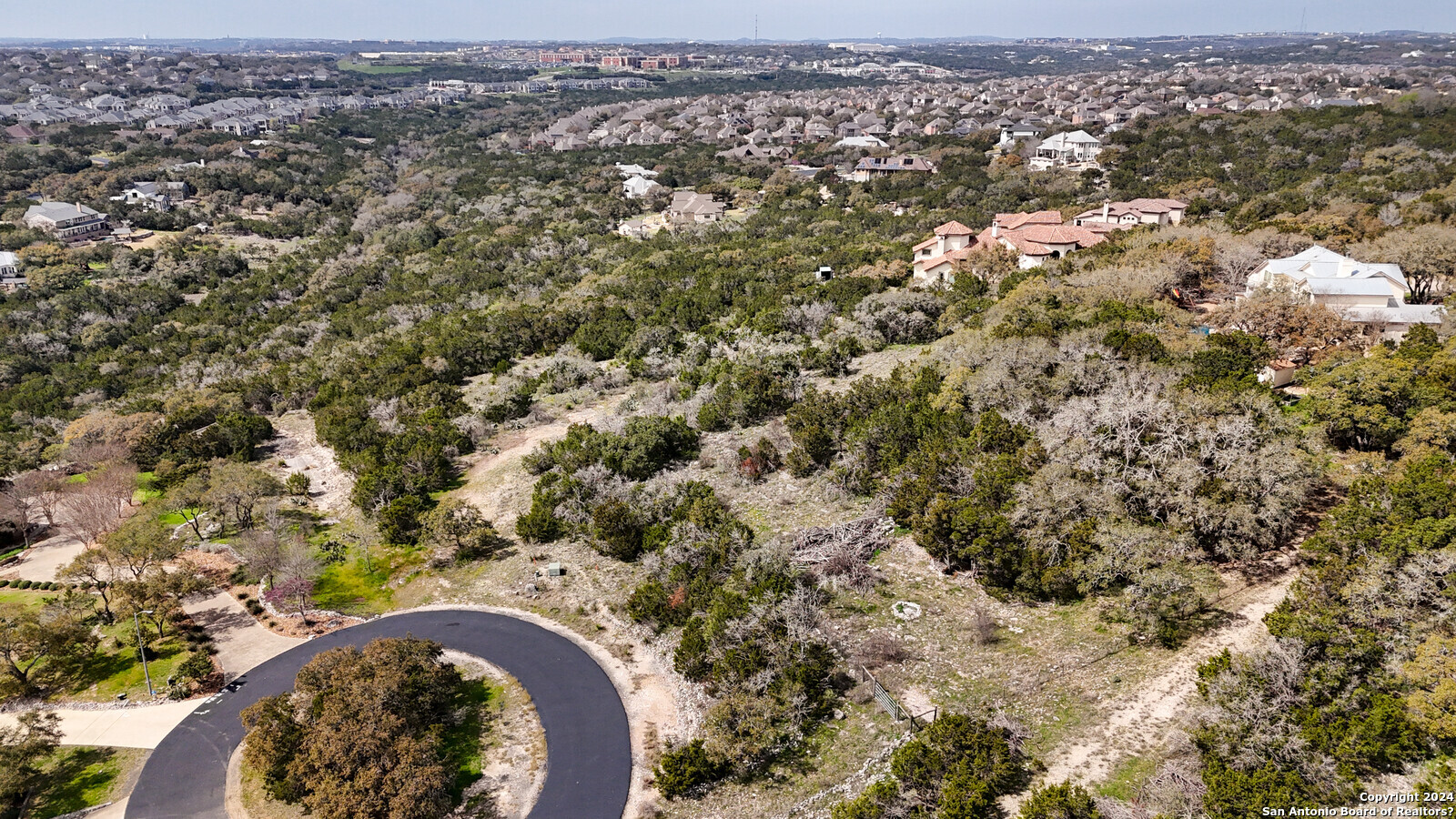 3907 Wilderness Rim San Antonio, TX 78261 - Photo 15 of 17 an aerial view of a houses with a outdoor space