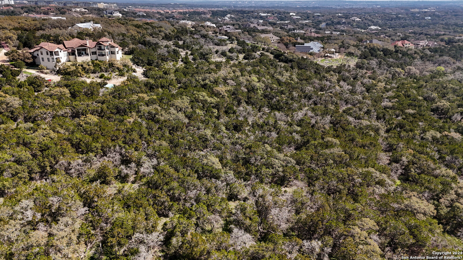 3907 Wilderness Rim San Antonio, TX 78261 - Photo 17 of 17 an aerial view of residential houses with outdoor space