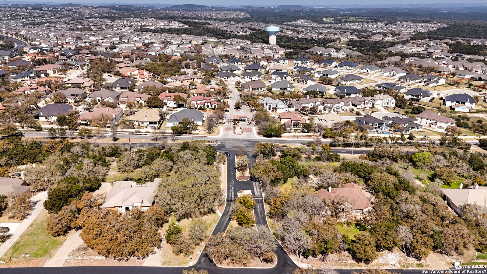 3907 Wilderness Rim San Antonio, TX 78261 - Photo 2 of 17 an aerial view of residential houses with city view