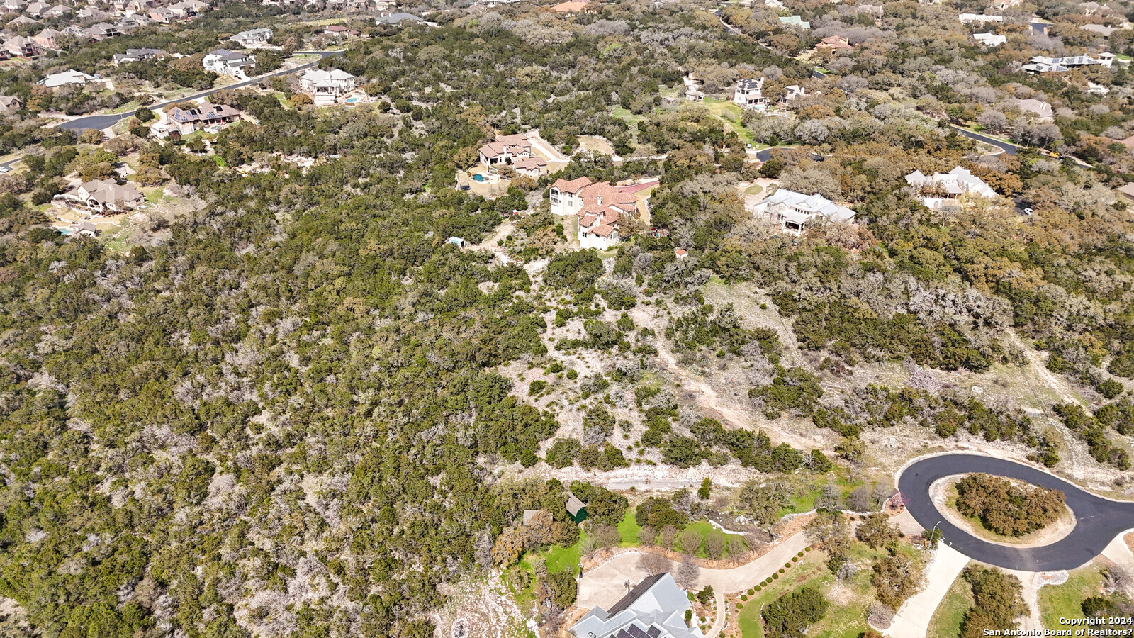 3907 Wilderness Rim San Antonio, TX 78261 - Photo 5 of 17 a bathroom with a sink and a toilet