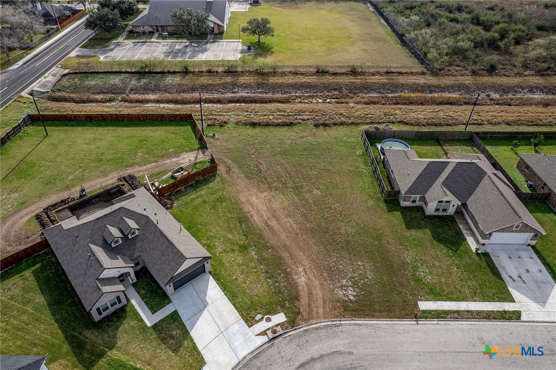 101 Opal Way Port Lavaca, TX 77979 - Photo 3 of 8 an aerial view of a house with a yard