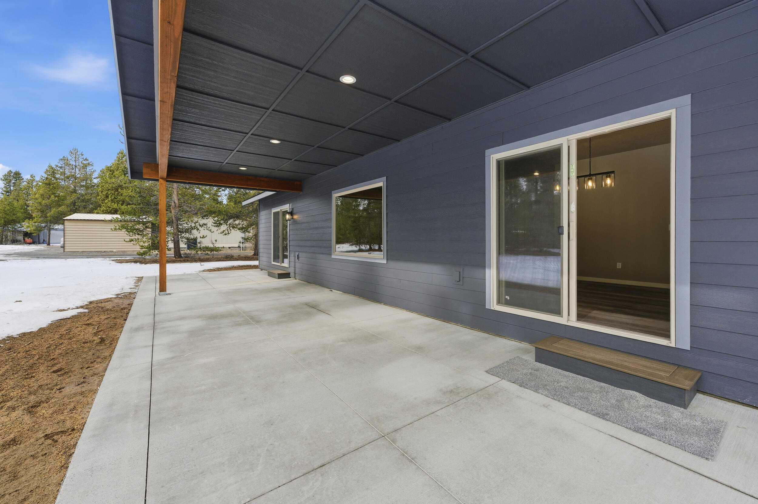 16083 Dyke Road, Unit 9 La Pine, OR 97739 - Photo 42 of 53 a view of a house with a porch